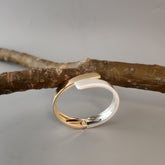 Dual tone overlap cuff